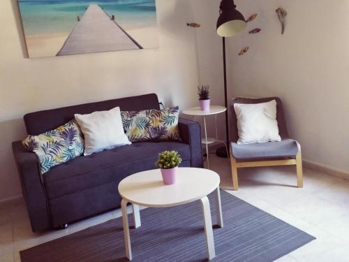 Ein Sitzbereich in der Unterkunft Apartamentos La Machacona Plaza Mayor