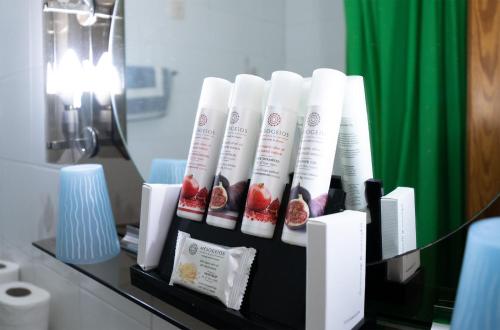 a shelf with a bunch of products on a table at Philoxenia Hotel in Skala Prinou