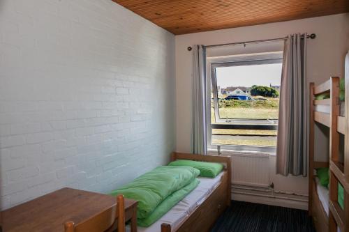 Postel nebo postele na pokoji v ubytování YHA Broad Haven
