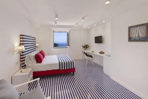 Ένα ή περισσότερα κρεβάτια σε δωμάτιο στο Gala Residence Villa Giovanna