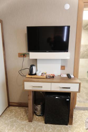 Η κουζίνα ή μικρή κουζίνα στο Marbes HOTEL