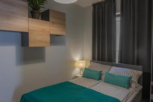 Postel nebo postele na pokoji v ubytování Moon Hostel Poznań