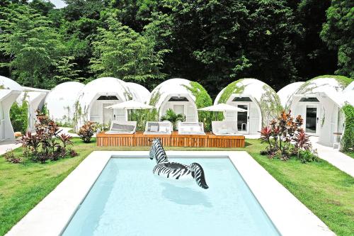 Zahrada ubytování Igloo Beach Lodge