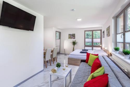 Posteľ alebo postele v izbe v ubytovaní Apartmán A Harrachov