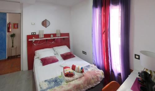 Cama o camas de una habitación en B&B Casa Alfareria 59