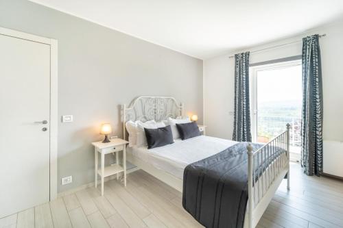 Posteľ alebo postele v izbe v ubytovaní La Villa Holiday House