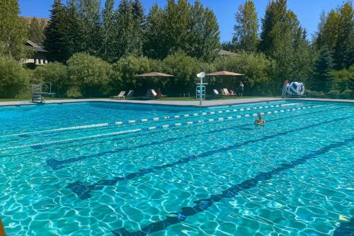 a person swimming in a swimming pool at Western Dreams in Sun Valley