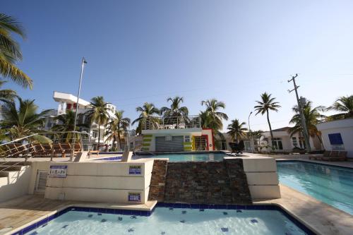 Bazén v ubytování Hotel Playa Blanca - San Antero nebo v jeho okolí