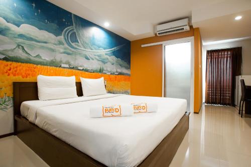 Katil atau katil-katil dalam bilik di Fun-D City View SHA Plus