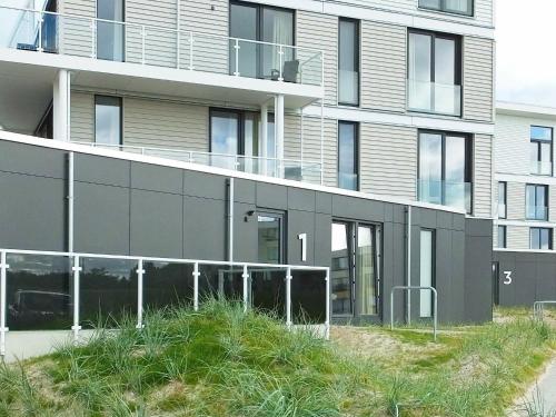 an external view of a building with grass in front of it at 3 person holiday home in Wendtorf in Wendtorf