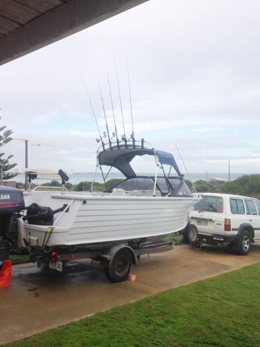 a boat is on the back of a truck at Family Tides in Wallaroo