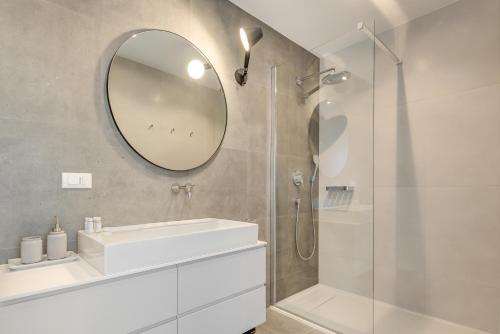 a bathroom with a sink and a mirror at Villa Juliet in Trogir