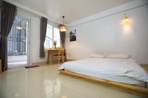 Кровать или кровати в номере Du Homestay 1
