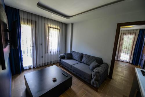 Χώρος καθιστικού στο Kibar Suite Hotel