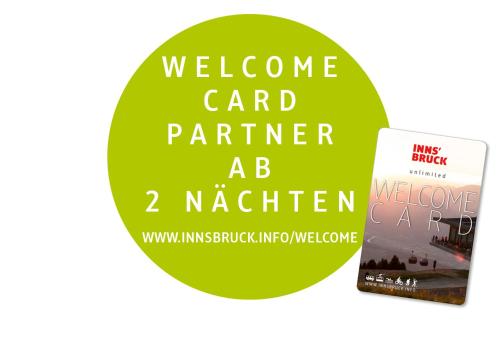 two books are sitting next to each other at Sporthotel Igls in Innsbruck