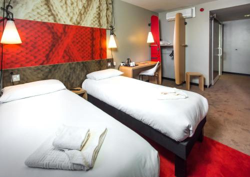 Tempat tidur dalam kamar di ibis Leicester