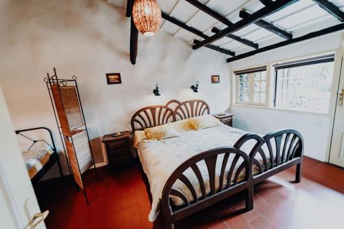 Tempat tidur dalam kamar di Finca El Lance