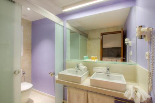 Ett badrum på Hotel El Pinar