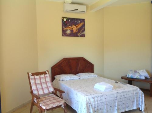 Uma cama ou camas num quarto em Pousada Shamballa