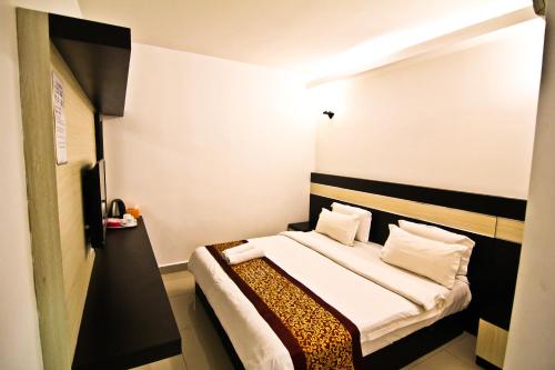 Katil atau katil-katil dalam bilik di Hotel Rasah Seremban