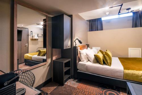 
Cama o camas de una habitación en The Alfred Hotel
