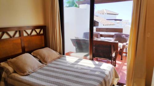 Postel nebo postele na pokoji v ubytování Vera playa apartamento 1dormitorio