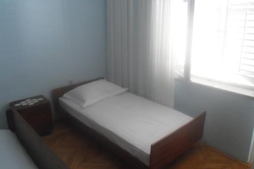 Postel nebo postele na pokoji v ubytování Hostel Guesthouse Mira