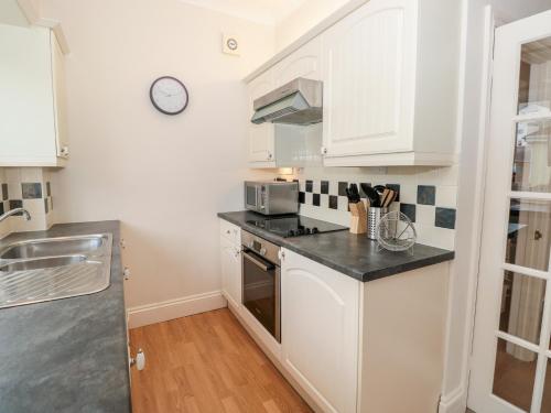 Una cocina o zona de cocina en Huffin