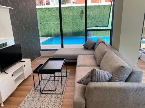 Χώρος καθιστικού στο LONDON OTEL