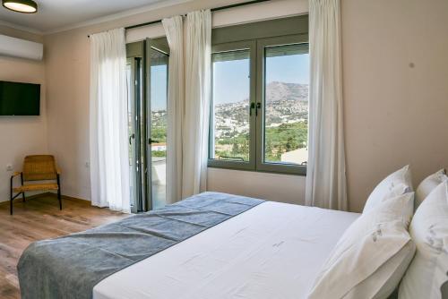 Posteľ alebo postele v izbe v ubytovaní Horizon Villa Almyrida