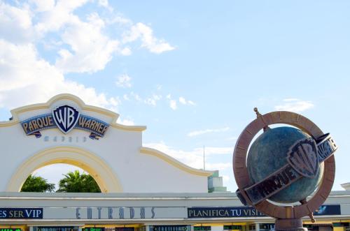a large sign in front of a building at Ramada by Wyndham Madrid Getafe in Getafe