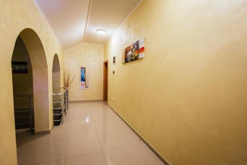a hallway of a building with at ATOS Srebrno jezero - Villa and Restaurant in Veliko Gradište