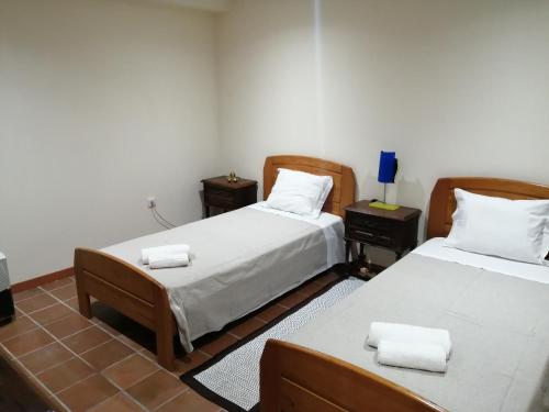 Postel nebo postele na pokoji v ubytování Casa de Madeira