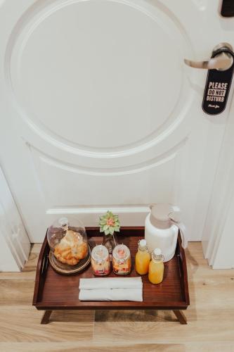 a tray of food on a table in a room at The Winston Solvang in Solvang