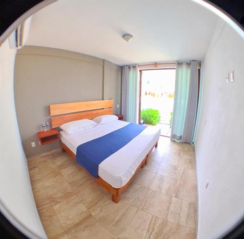 Posteľ alebo postele v izbe v ubytovaní Hotel Casa Shula, Acapulco