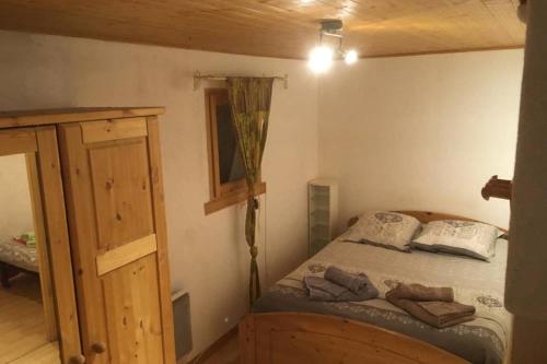 Postel nebo postele na pokoji v ubytování Vallée de Chamonix au pied des pistes