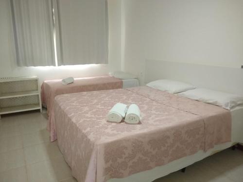 Ένα ή περισσότερα κρεβάτια σε δωμάτιο στο Apto 2/4 resort TreeBies- Subaúma