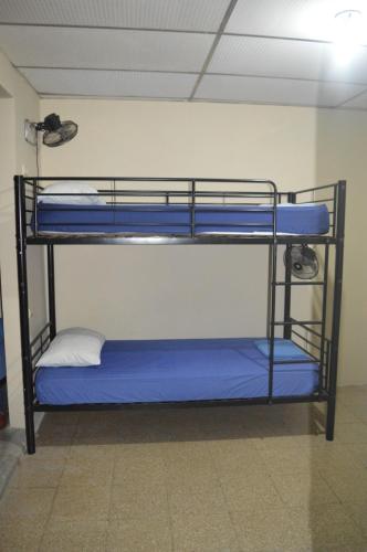 Ein Bett oder Betten in einem Zimmer der Unterkunft Casa Michael