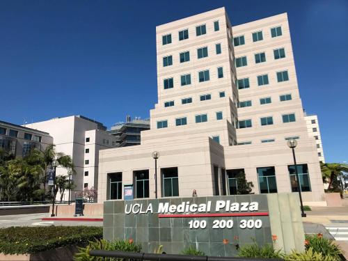 a white building with amedical plaza sign in front of it at Perfect Apt near UCLA w Parking Gym Pool WIFI in Westwood B3 in Los Angeles