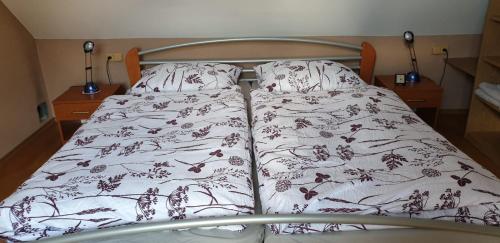 Posteľ alebo postele v izbe v ubytovaní Lastovička