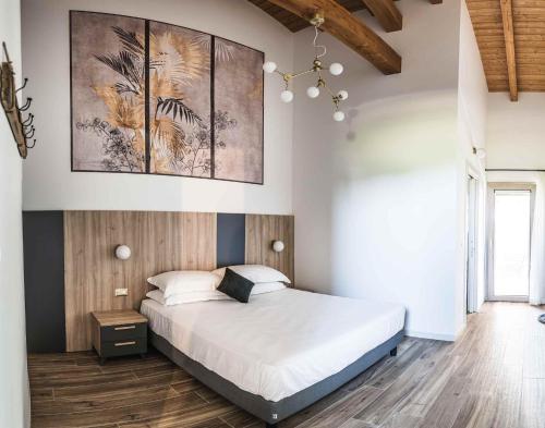 Postel nebo postele na pokoji v ubytování Agriturismo Casale ai Prati