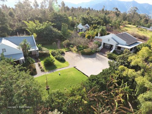 an aerial view of a house with a yard at Swellendam Country Lodge - Guest House - B&B in Swellendam