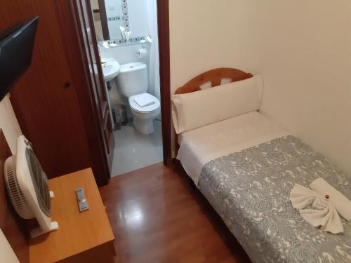 Letto o letti in una camera di New Go Inn