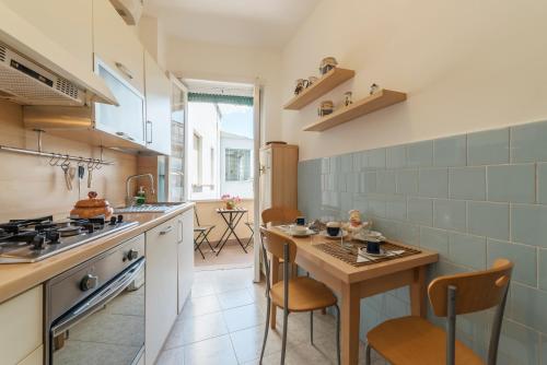 A kitchen or kitchenette at San Giovanni Apartment with Balcony