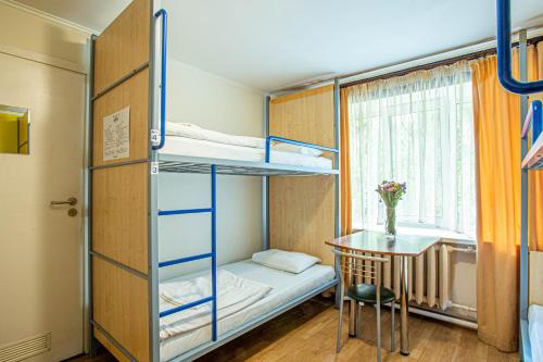 Кровать или кровати в номере Gar'is Hostel Kyiv