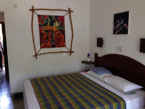 Katil atau katil-katil dalam bilik di Wunderbar Beach Hotel