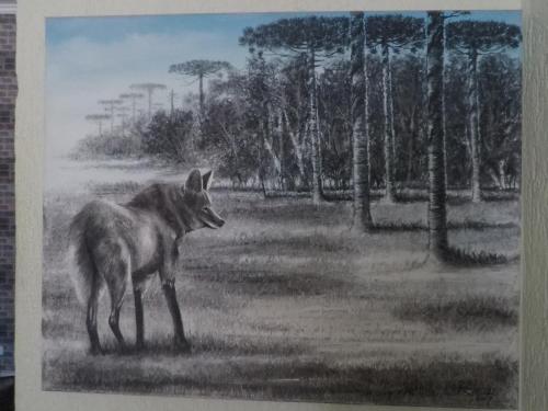 a painting of a dog standing in a field at Hotel Rota Dos Tropeiros in Castro