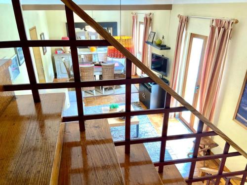 a view of a staircase in a living room at Casa de Manteigas in Manteigas