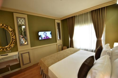 Katil atau katil-katil dalam bilik di Sunlight Hotel