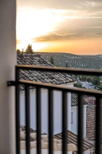 a view of the sunset from a balcony at Casa Paseo Del Sauce in Cazorla